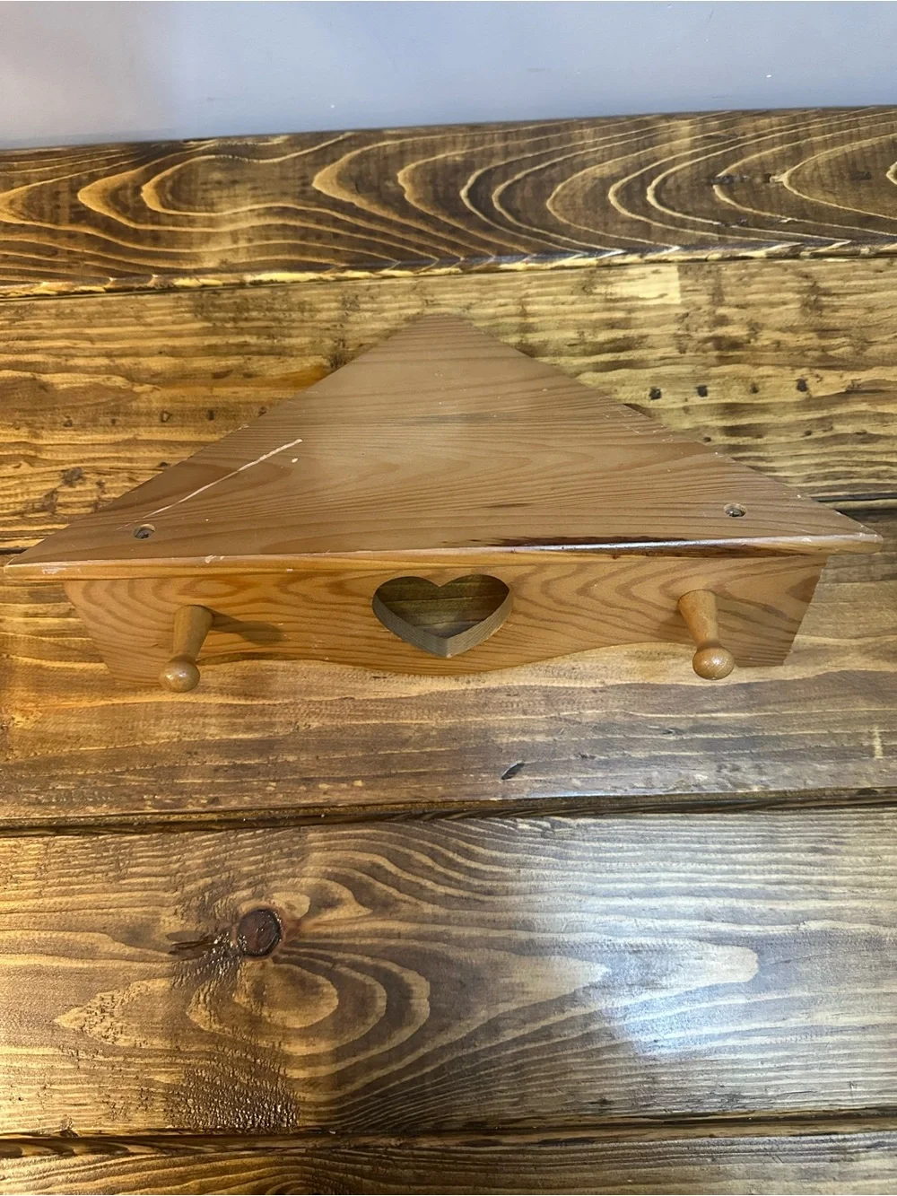 Vintage wooden heart coat corner wall shelf with two pegs.